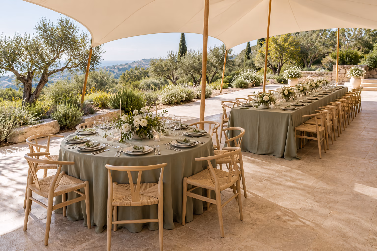 Illustration of round and rectangular wedding tables beneath an ivory stretch canopy.