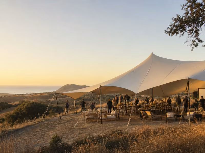 Large Bedouin-style stretch tent installed for an outdoor event