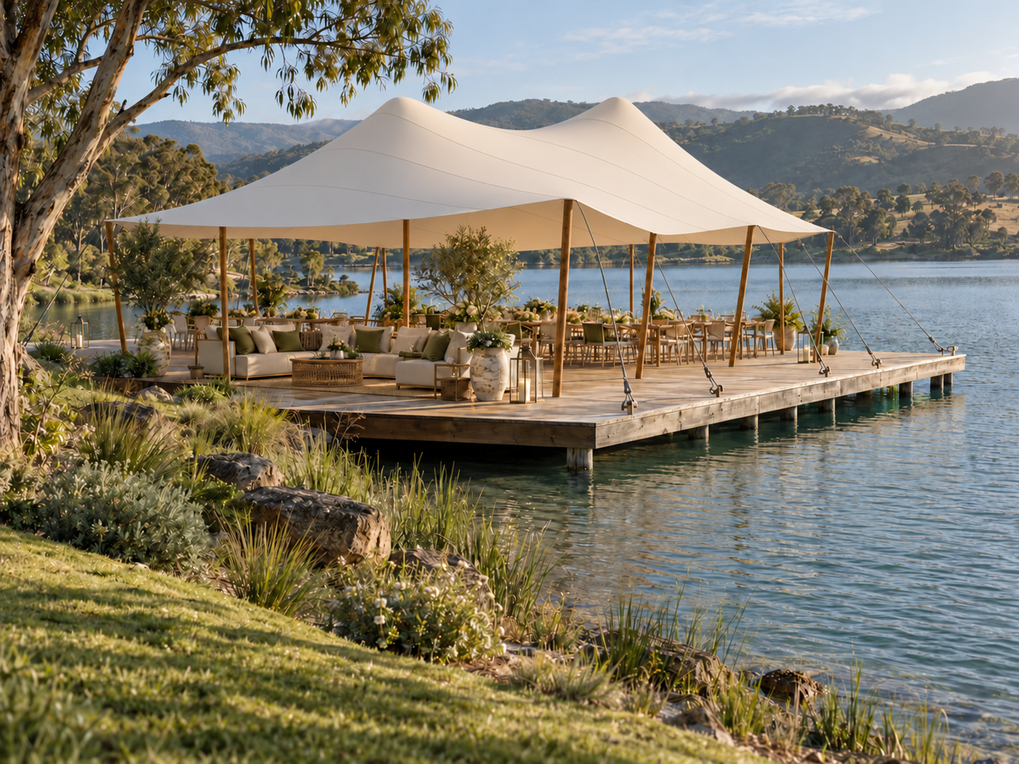 Illustration of an open-sided stretch tent with curved fabric, supporting poles and anchored edges beside a lake
