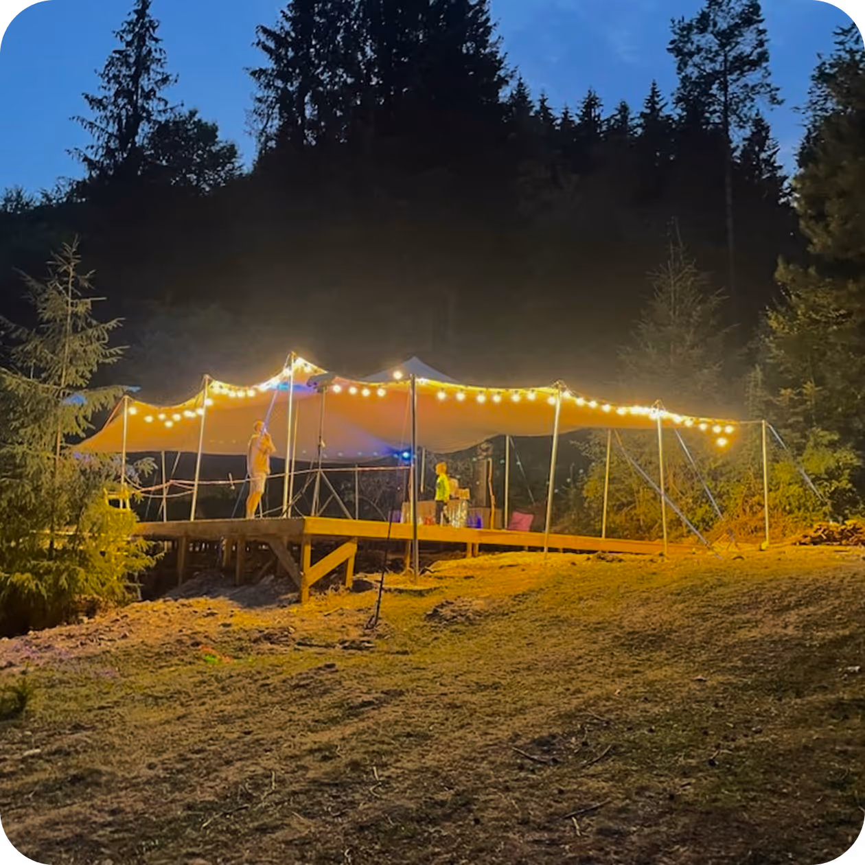 Bedouin-style stretch tent providing shade at a winery event